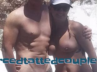 Piercedtattedcouple